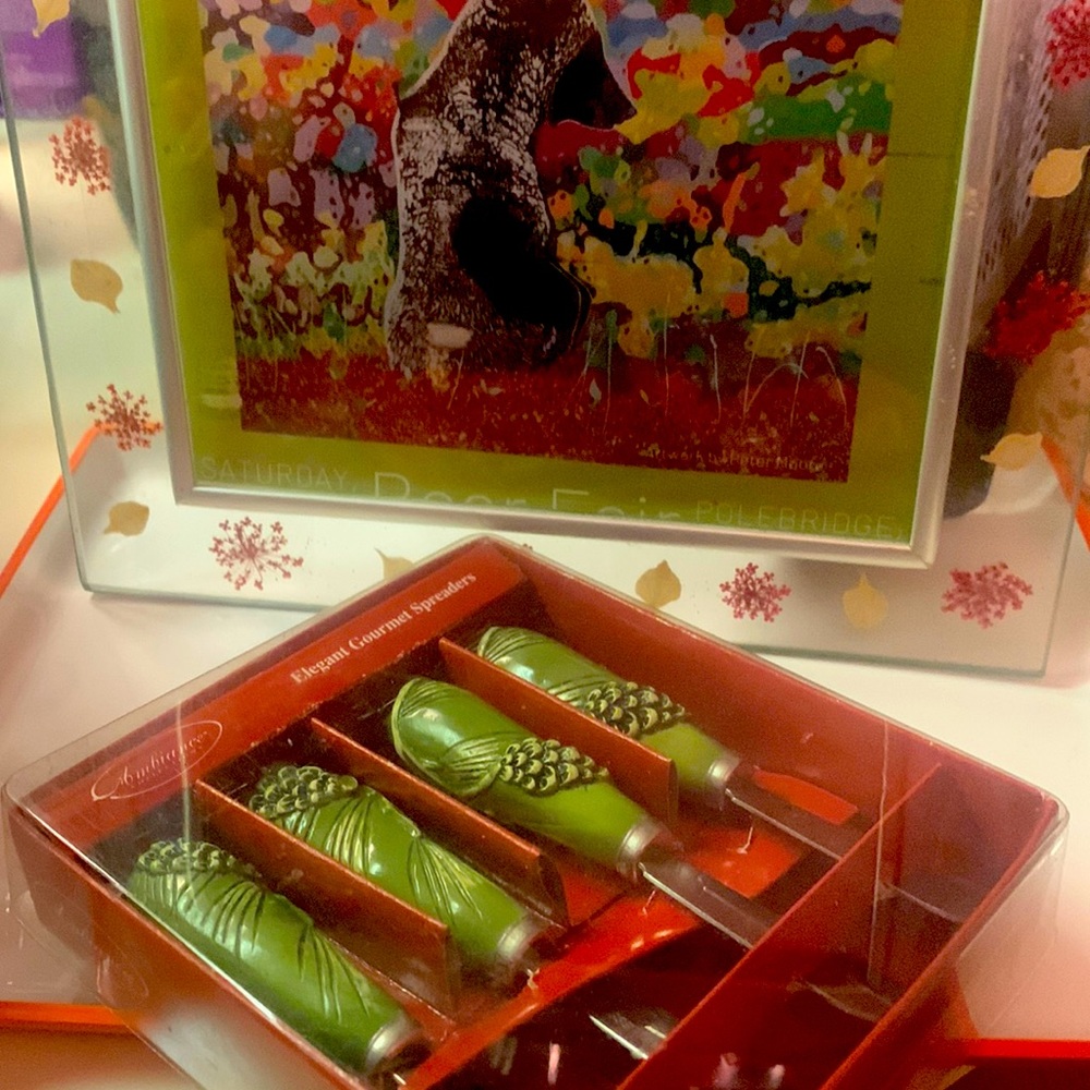 Green pine cone and needle art spreaders.